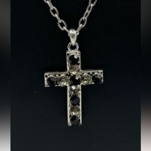 Cross pendant with long chain